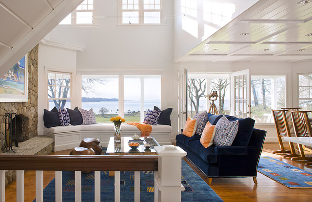A Cape Cod living room with a fireplace.