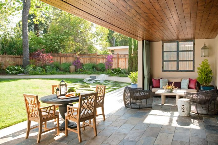 A patio with furniture and fireplace for outdoor get-togethers.