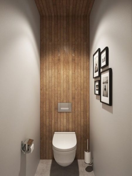 Use of natural materials for walls and roof in a tiny bathroom
