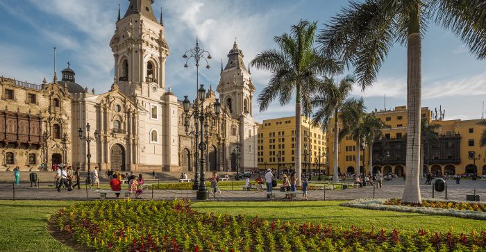A plaza with palm trees in Peru.