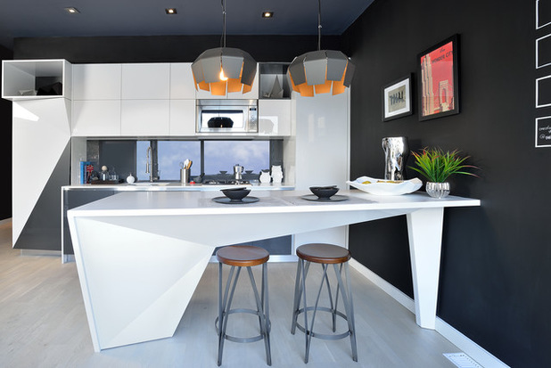 A black and white kitchen with faceted interior design elements.