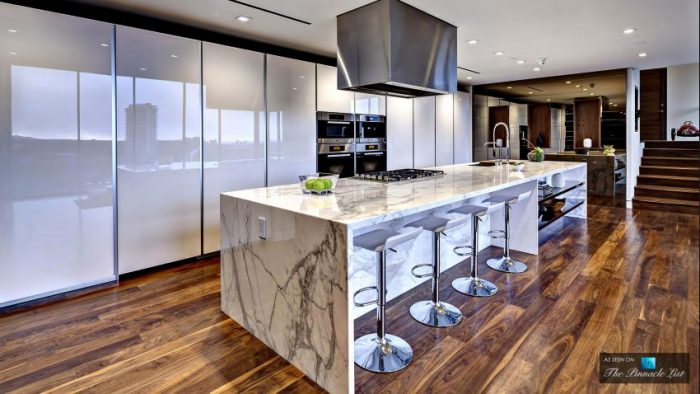 Stunning residence with a modern kitchen and marble counter tops.
