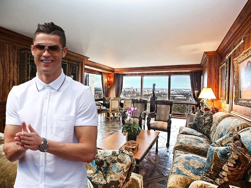 Cristiano Ronaldo standing in front of a large living room.