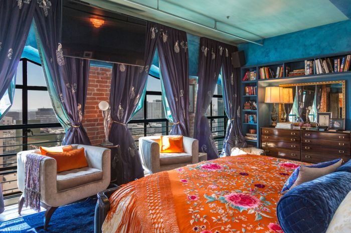 Johnny Depp's Penthouse featuring a blue and orange bedroom.