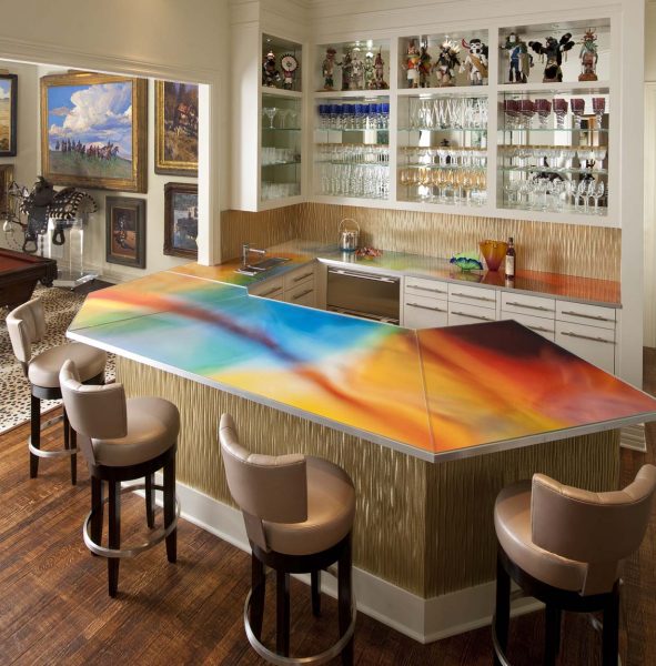A home bar with a colorful counter top.