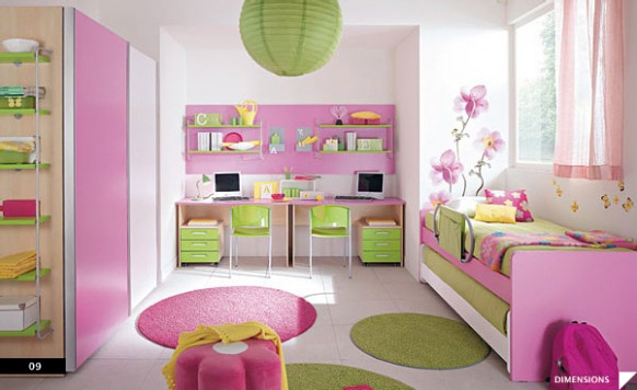 A child's room decorated in pink and green.