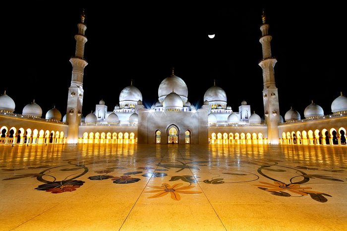 The grand mosque in Abu Dhabi at night.