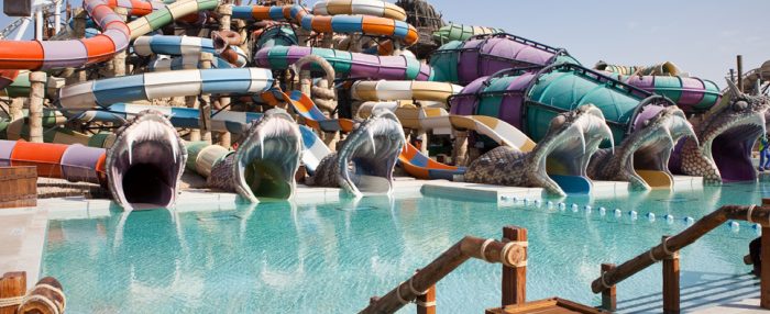 A water park in Abu Dhabi with a lot of water slides.