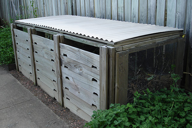 A wooden compost bin.
