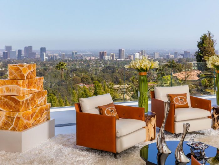 A living room with furniture and a view of the city at 924 Bel Air Rd.