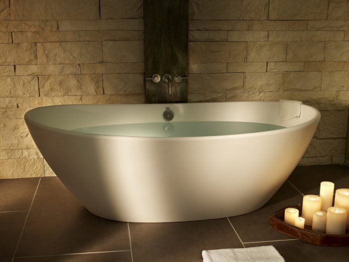 Freestanding soaker tubs appear elegant.