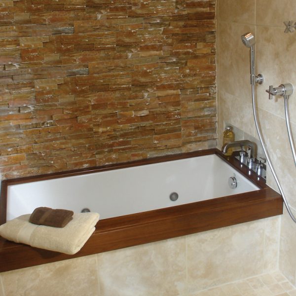 Wood trim adds a custom feel to this soaking tub