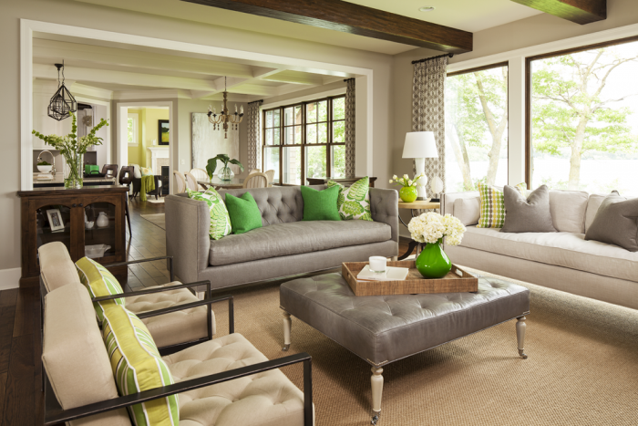 A living room featuring the 2017 interior trends of grey and green accents.