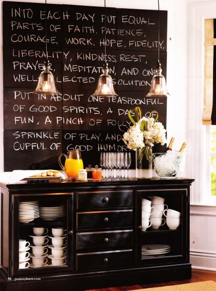 Certainly, the chalkboard wall charms visitors to this kitchen.
