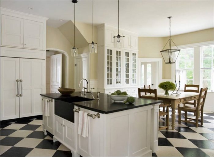 These black &amp; white floor tiles add charm. In fact, the large format floor tile is a trend of its own!
