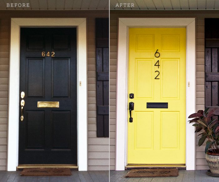 A black and yellow door with a number painted on it, enhancing curb appeal.
