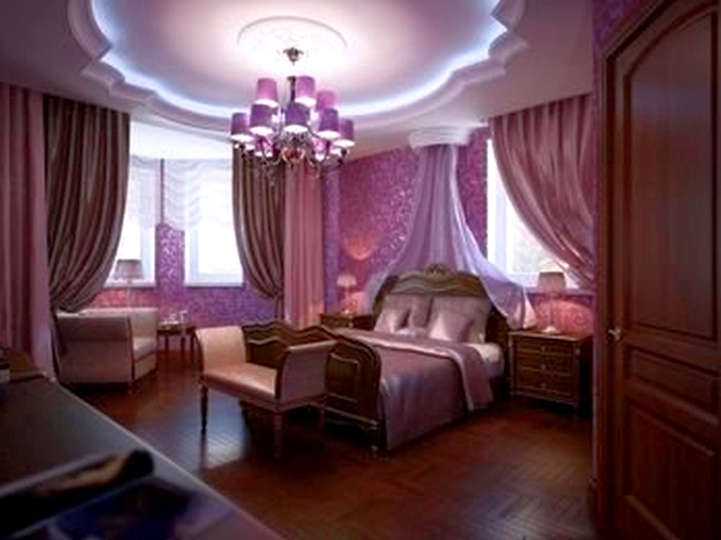 An affordable bedroom with purple walls.