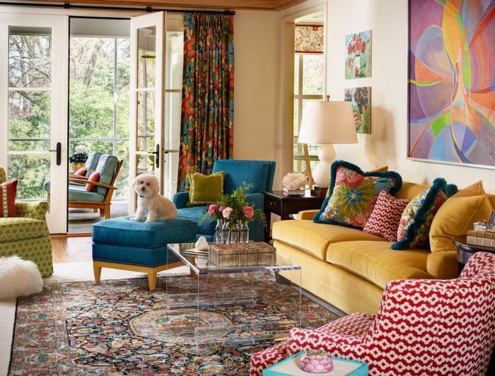 A living room with colorful furniture, mixing patterns.