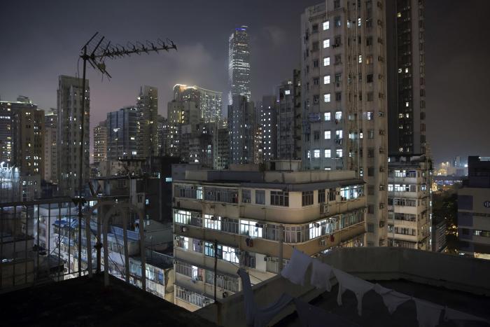 Keywords: Hong Kong, 'coffin homes'

Modified Description: Unbelievable Life Inside Hong Kong's 'coffin homes' at night.