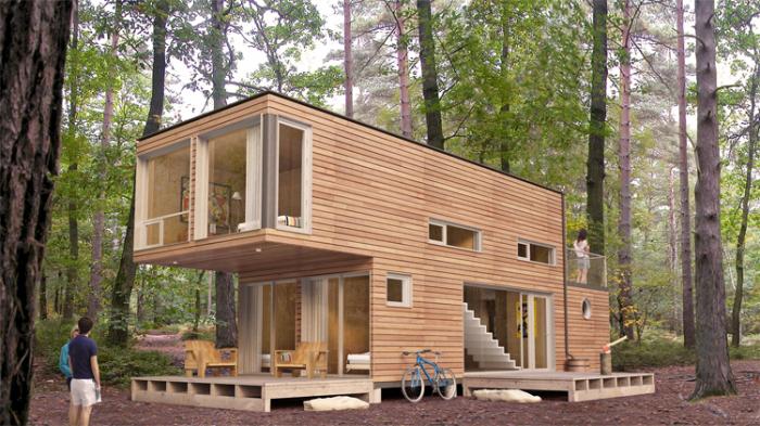 A small container house in the woods with top 15 tiny house designs and floor plans.