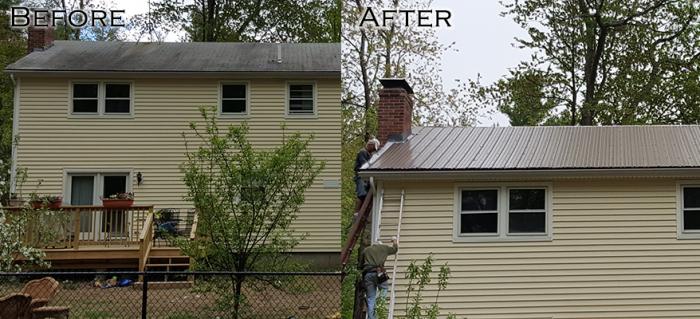 A house with a metal roof undergoes exterior renovations.