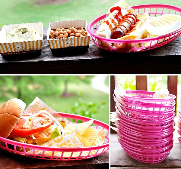 A backyard cookout with hot dogs in a basket.