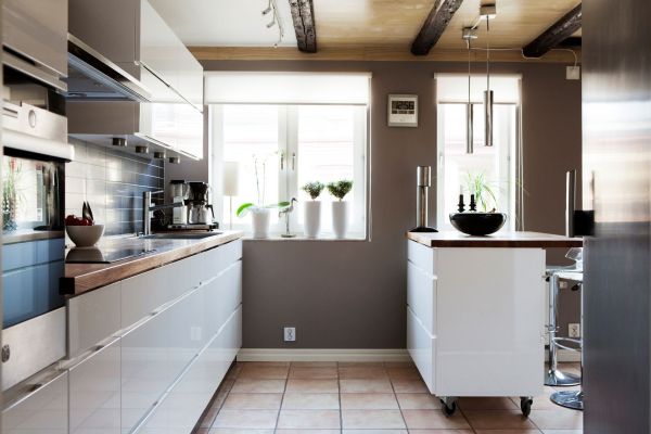 A Swedish kitchen with white cabinets.