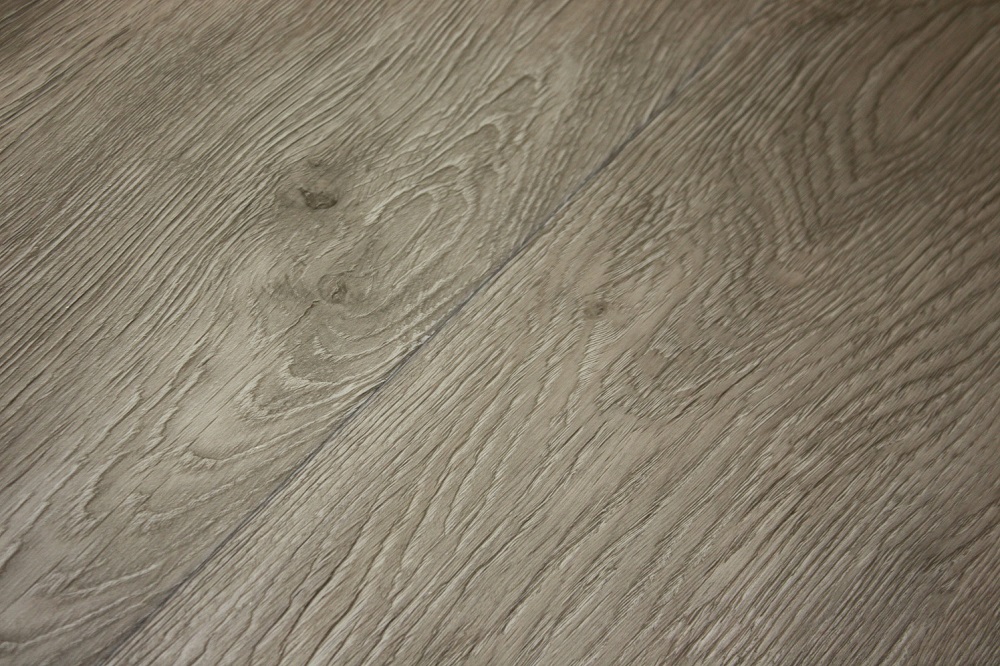 A close up view of a hardwood floor.