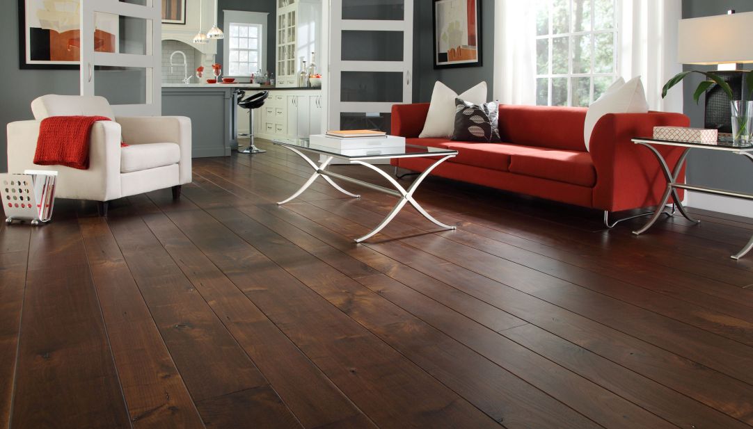 A living room with hardwood flooring.