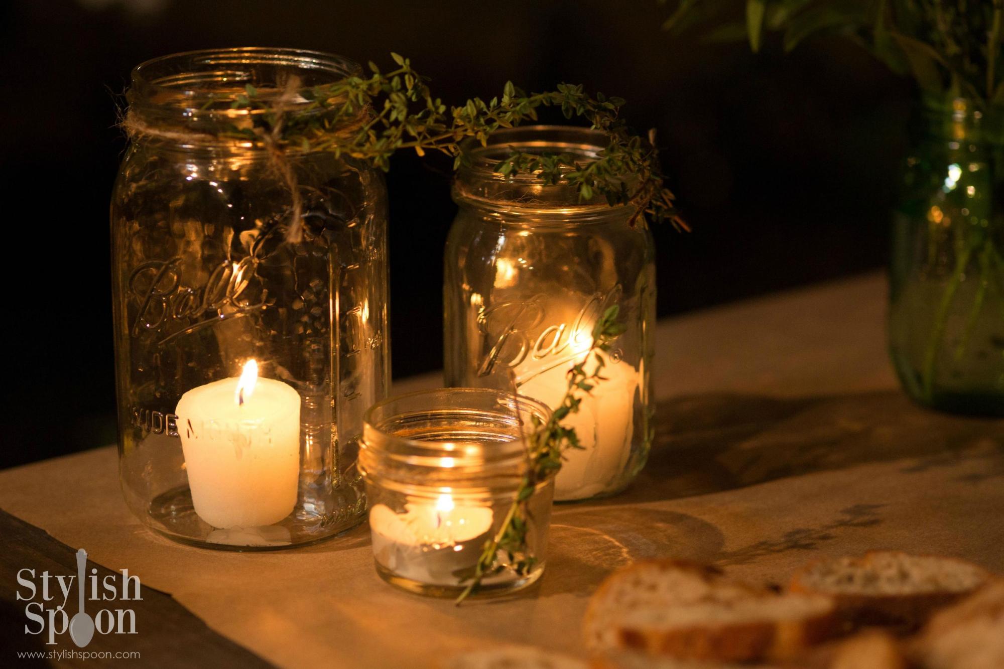 Mason jars with candles and bread.
