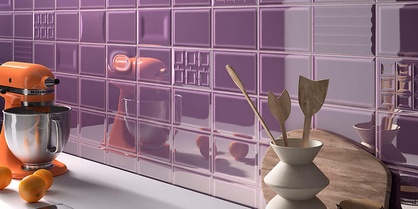 A kitchen with a Pantone's Ultra Violet tiled wall.