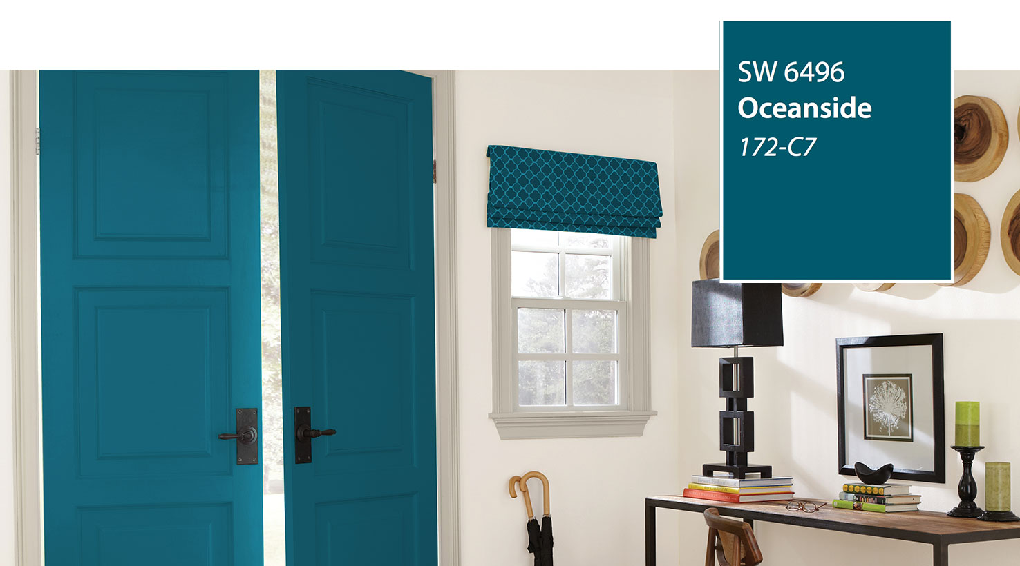 A blue door in an oceanside living room.