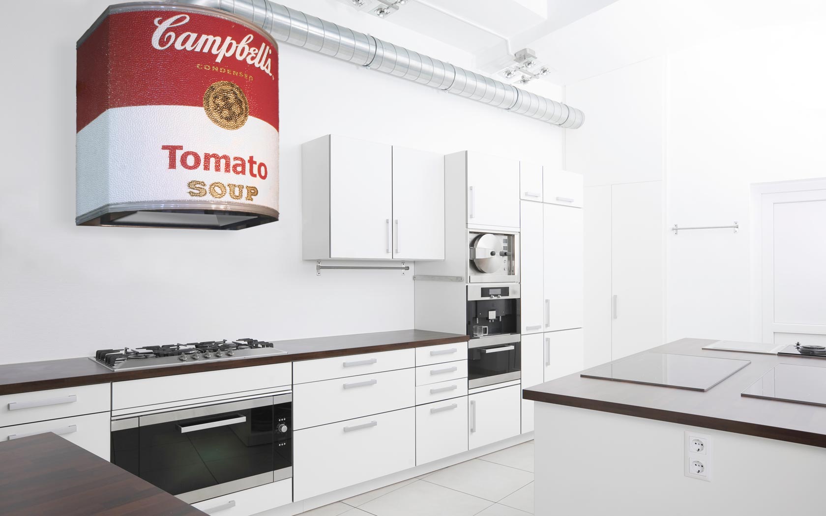 A pop art kitchen with a Campbell's tomato can hanging above the stove.