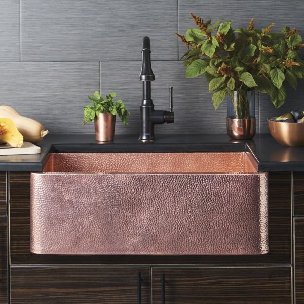 A copper kitchen sink.
