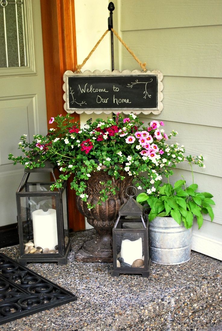 Front porch decorating with a potted flower arrangement.