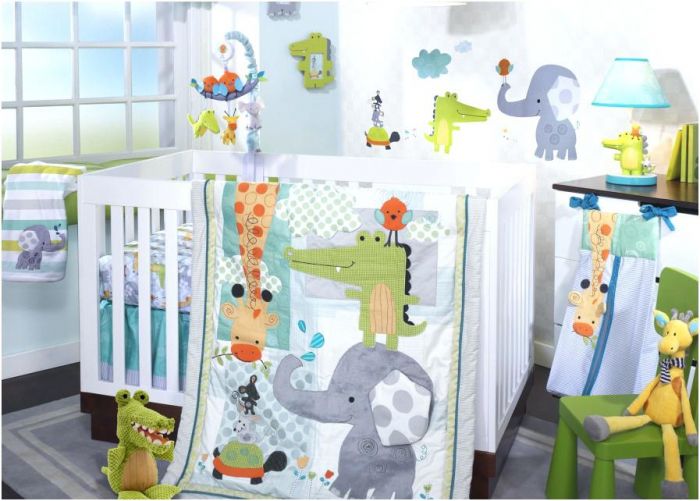 A gender-neutral nursery with giraffes, elephants, and zebras.