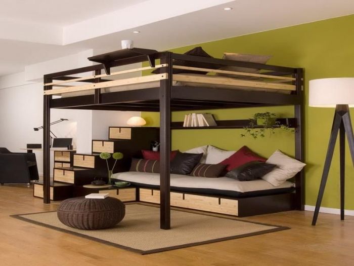 Naturally, the space below this bed is put to good use. But, do you see that the stairs are also storage drawers?