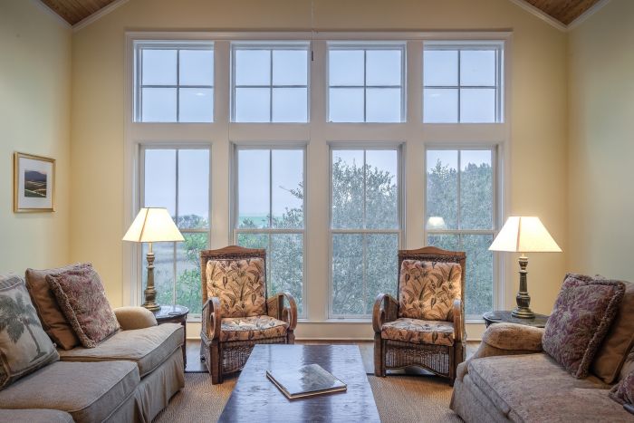 Indeed, traditional windows are the perfect look for this home. The park view outside's not too shabby, either!