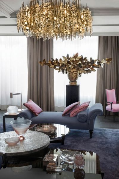Designer tips for a living room with a large chandelier.
