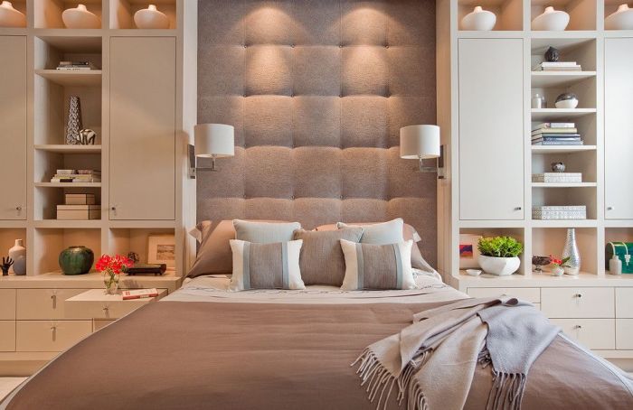 Designer tips for a bedroom with a bed and bookshelves.