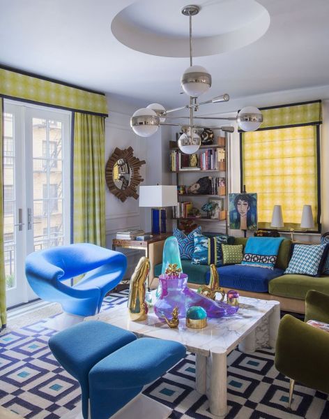 Designer tips for a living room adorned with blue and green furniture.