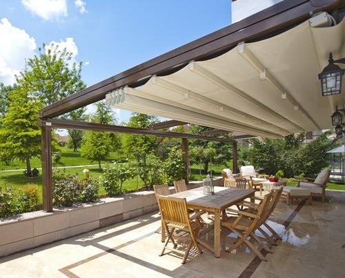 A patio with a retractable roof awning.