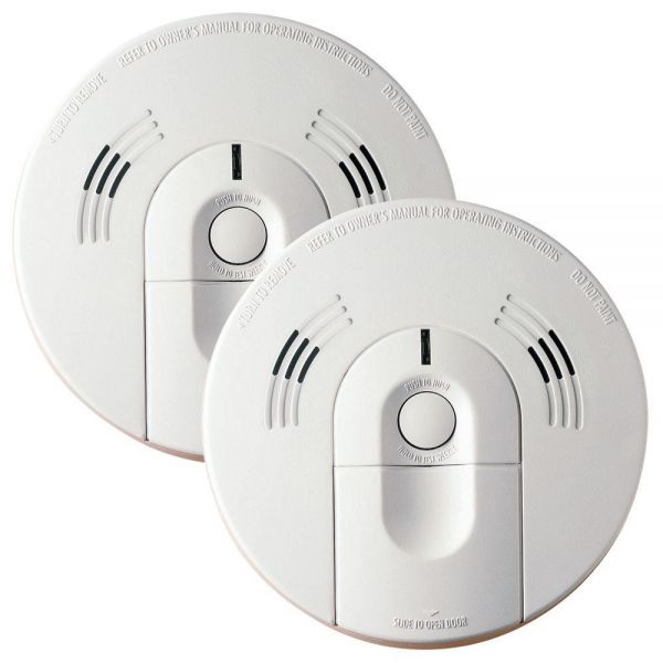 Two home safety smoke detectors on a white background.