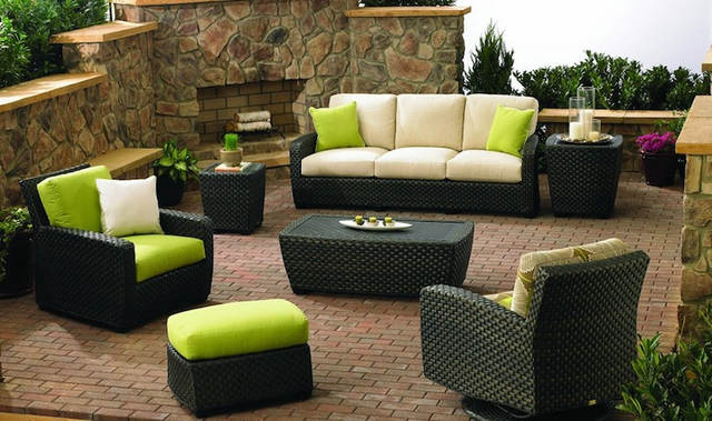 Decorate patio with a wicker patio furniture set.