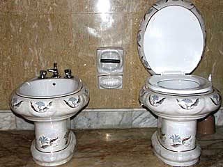 Two DIY toilets in a bathroom remodel.