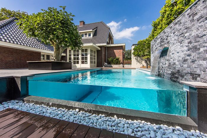 A house with an outdoor swimming pool.