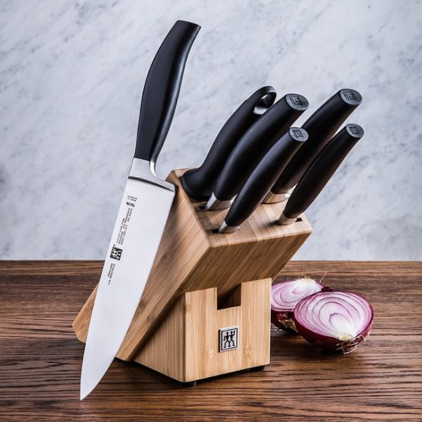 A versatile set of knives on a wooden block.
