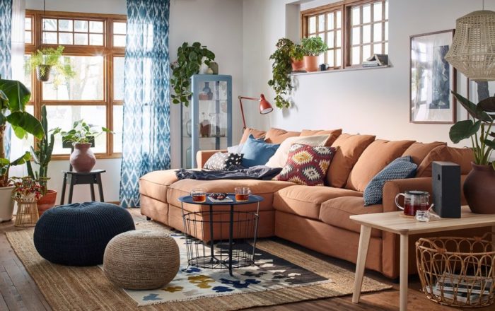 A cozy living room with a tan couch.