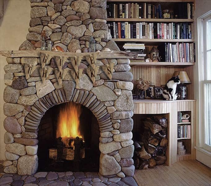 A room with a cozy fireplace.