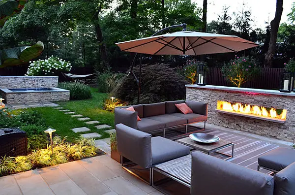 A garden with outdoor furniture.